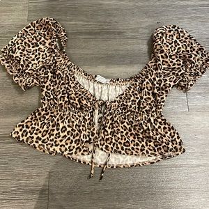 Urban Outfitters cheetah going out top